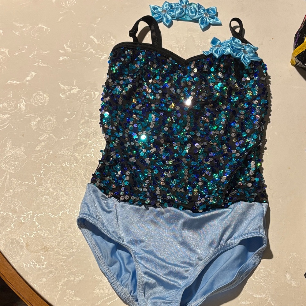 Sparkling Blue Sequin Kids Dance Costume with tutu and fringe bottom.